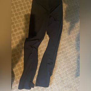 black flared leggings with crossed fit at top